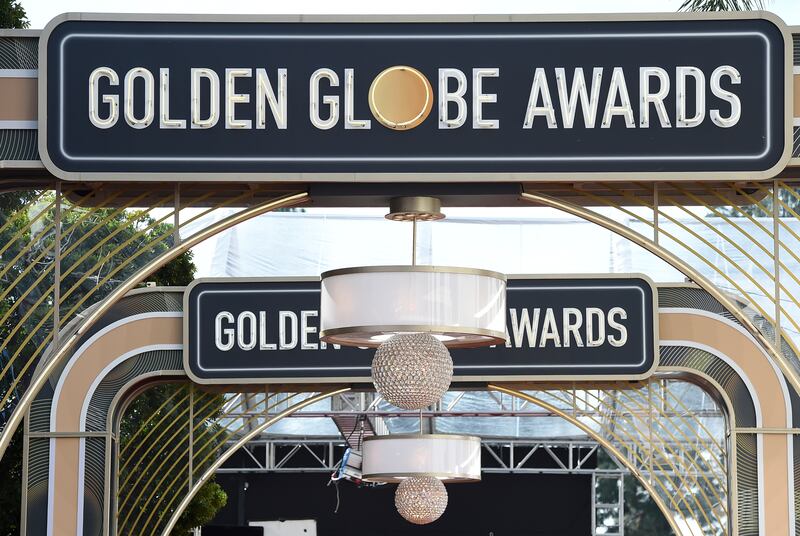 Event signage appears above the red carpet at the 77th annual Golden Globe Awards, on Jan. 5, 2020, in Beverly Hills, Calif.