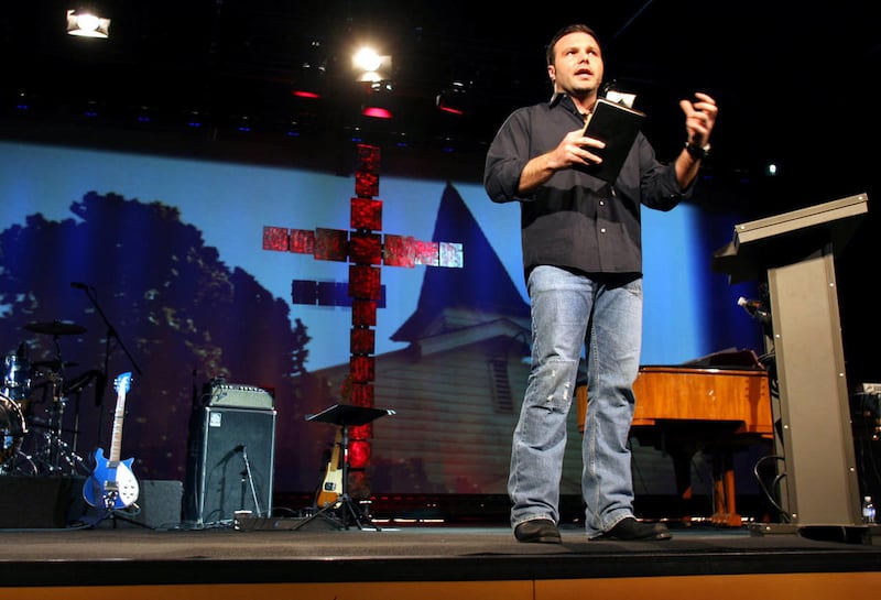 Mars Hill Church Lead Pastor Mark Driscoll, 36, preaches during an evening service on Sunday Feb. 11, 2007 at the church's flagship black warehouse in Seattle's trendy Ballard neighborhood. In a liberal city notorious for being "unchurched," Mars Hill has