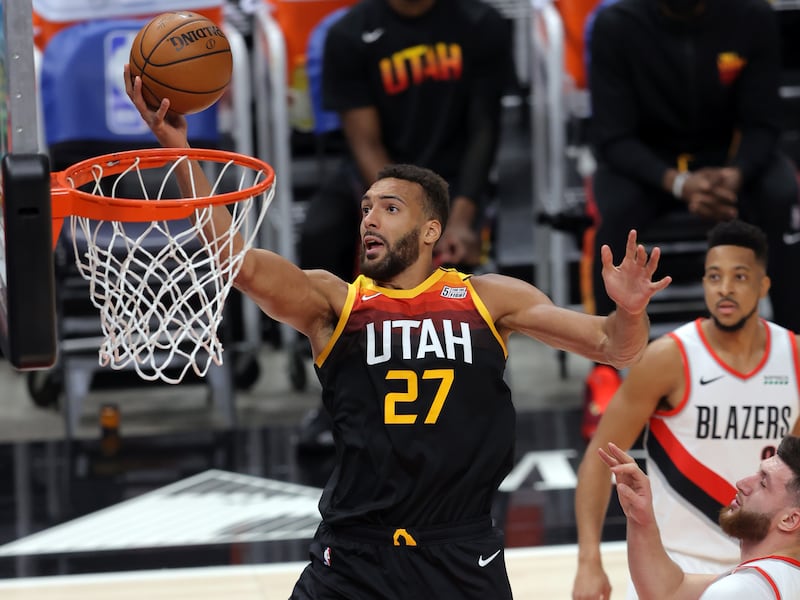 Jazz center Rudy Gobert shoots over the Trail Blazers’ Jusuf Nurkic at Vivint Arena in Salt Lake City in 2021.
