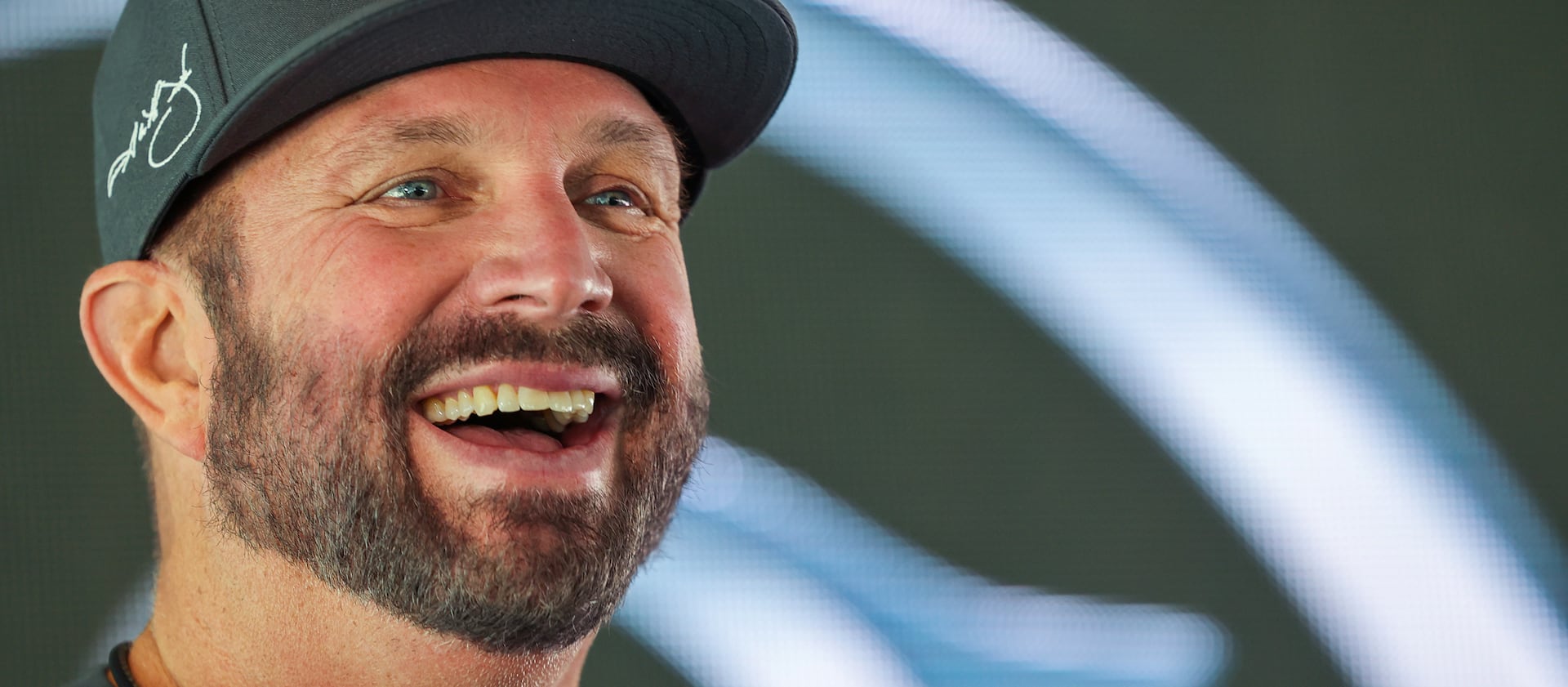 Country music superstar Garth Brooks talks with members of the media during a press conference.