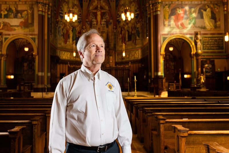 Andy Airriess, historian and public relations liaison for the Knights of Columbus fraternal organization, poses for a portrait at the Cathedral of the Madeleine in Salt Lake City.