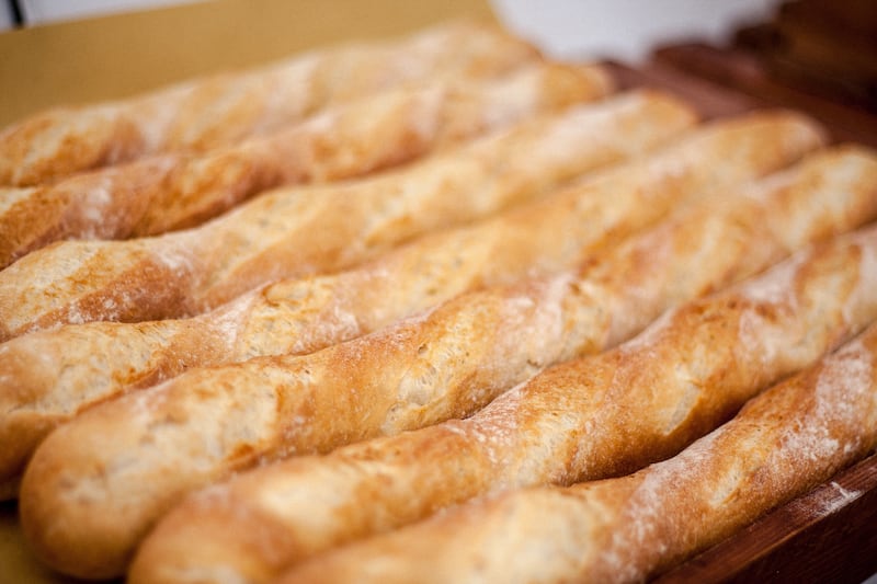 French baguettes pictured in a row.