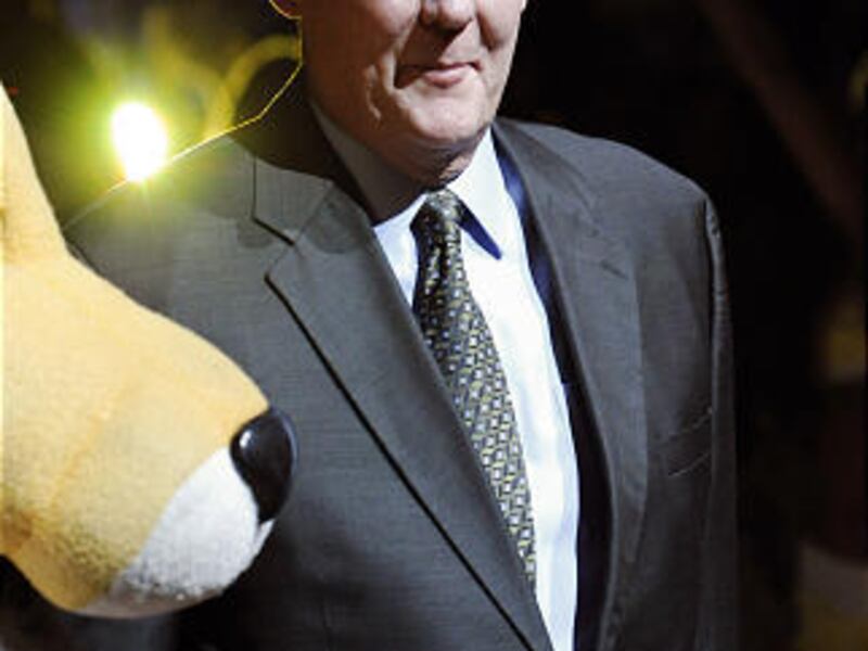 Denver Nuggets head coach George Karl walks on the court before the start of the team's season opener against the Utah Jazz during an NBA basketball game Wednesday, Oct. 27, 2010, in Denver.