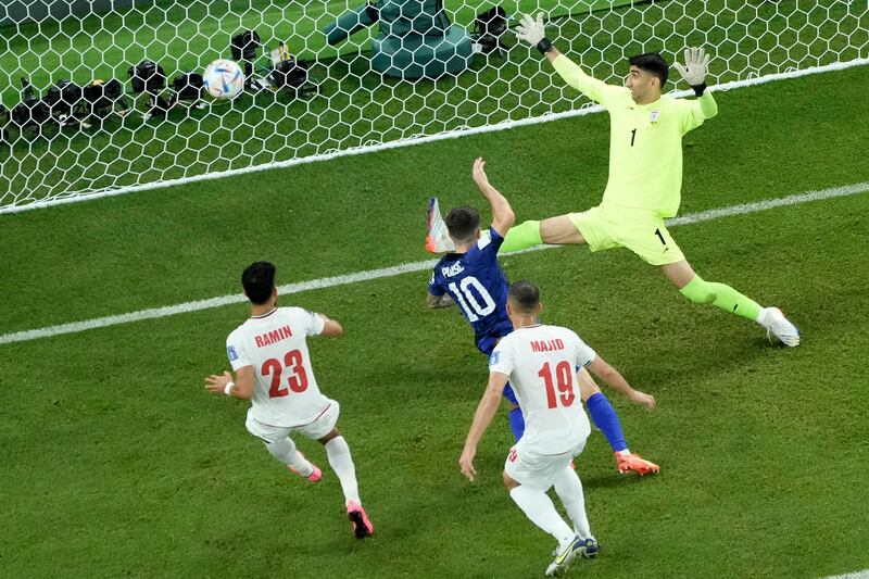 Christian Pulisic of the United States scores during the World Cup group B soccer match between Iran and the United States in Doha, Qatar, Tuesday, Nov. 29, 2022.