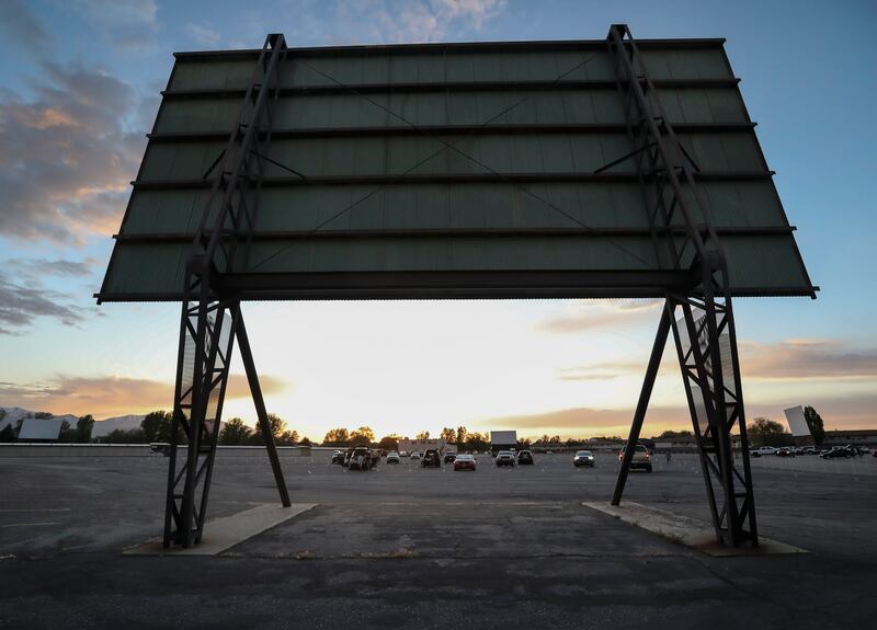 Moviegoers are parked with two spaces between each vehicle as Redwood Drive-In Theatre opens for business in West Valley City on Friday, May 1, 2020. The drive-in was closed because of the COVID-19 pandemic.