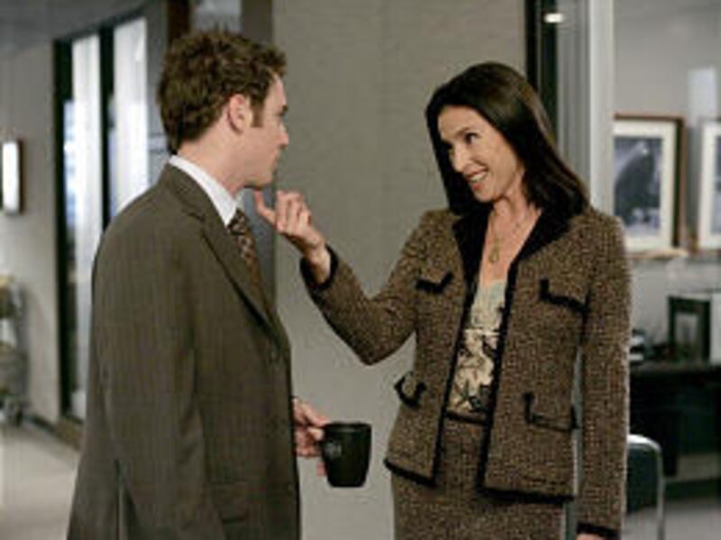 Meryl (Mimi Rogers) flirts with Sam (Bret Harrison) in an episode of the new Fox comedy "The Loop," which airs tonight at 8:30.