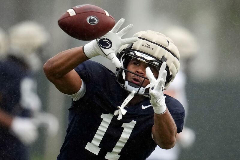 Penn State linebacker Abdul Carter makes a catch during practice ahead of the Rose Bowl game against Utah, Dec. 30, 2022,