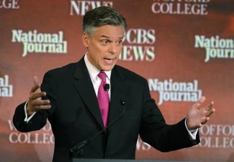 In this Nov. 12, 2011, file photo, Republican presidential candidate Jon Huntsman, former Governor of Utah, speaks at the CBS News/National Journal foreign policy debate at the Benjamin Johnson Arena, in Spartanburg, S.C.