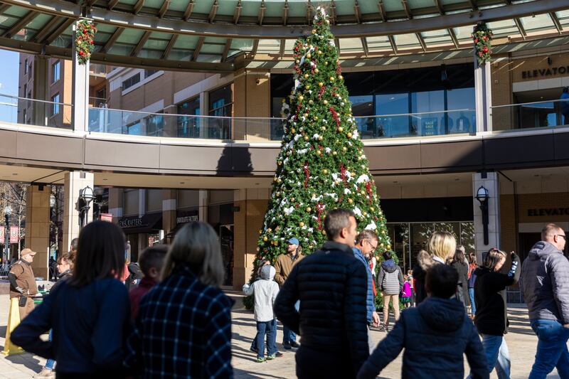 Shoppers walk around City Creek Center in Salt Lake City on Dec. 17, 2022.