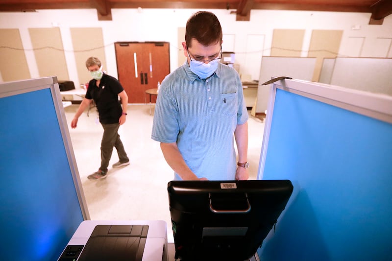 Randy Grove votes in Brentwood, Tenn.