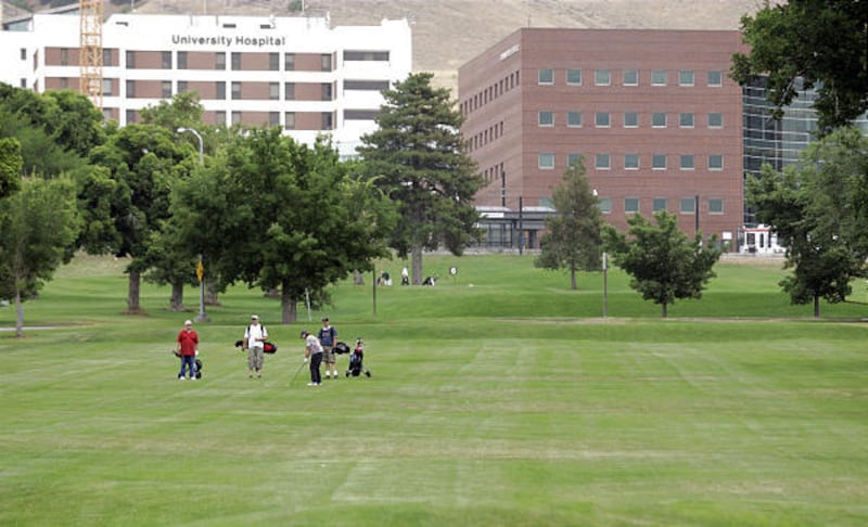 Golfers play on the 9th hole at the University of Utah golf course. It may be closing soon to make room for new buildings on campus.