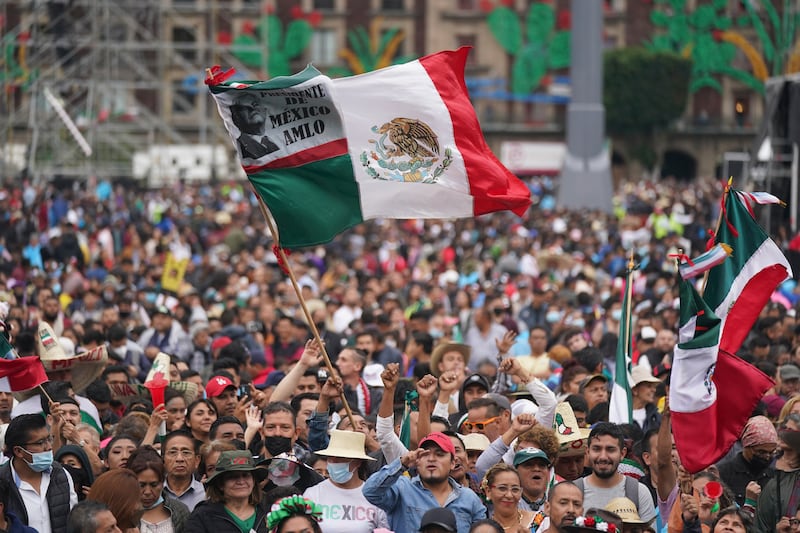 Revelers celebrate before the Independence Day celebrations at Mexico City’s main square.