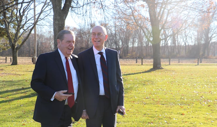 President Henry B. Eyring and Elder Jeffrey R. Holland enjoy a moment at the monument dedicated to Wilford Woodruff, located less than a mile from the original site of the Woodruff family home and mill in Farmington, Connecticut. The Church leaders toured the historical sites prior to the dedication of the Hartford Connecticut Temple.