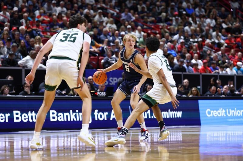 Utah State guard Jordy Barnes dribbles during MWC tournament semifinal game in Las Vegas, Friday, March 14, 2025.