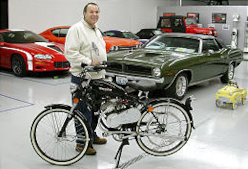Joe Arrotta's collection includes a Whizzer bike, pedal car and a Plymouth Barracuda convertible driven in the '70s "Mannix" TV show.