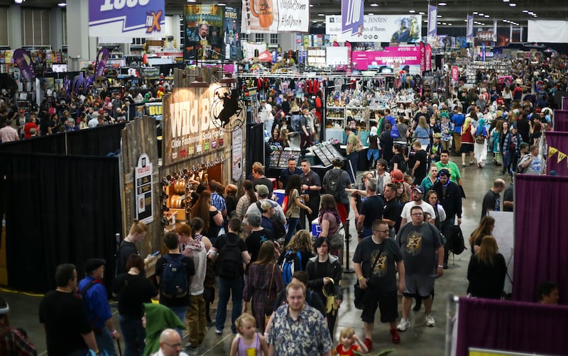 Patrons make their way from booth to booth during the FanX Spring Comic Convention at the Salt Palace Convention Center in Salt Lake City on Friday, April 19, 2019.