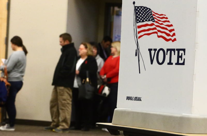 FILE - Voters in Herriman line up early at Unified Fire Authority Rosecrest fire station 123 on Tuesday, Nov. 8, 2016.