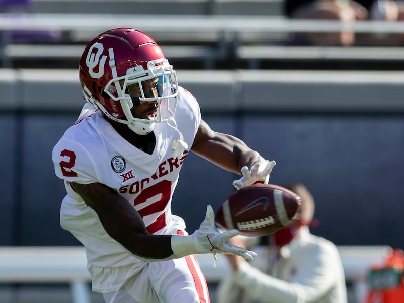 Former Oklahoma Sooners wide receiver Theo Howard, now of the Utah Utes, warms up before a game.