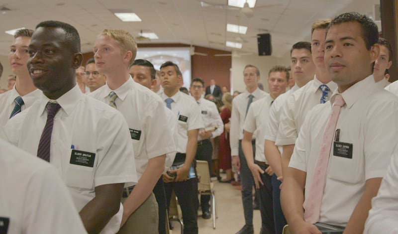 Missionaries await the arrival of President Russell M. Nelson and Elder Dale G. Renlund at a missionary meeting on Sept. 1, 2018, in Santo Domingo, Dominican Republic.