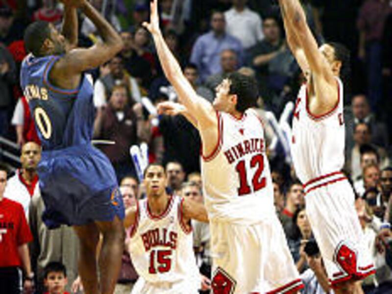 Washington's Gilbert Arenas hits the game-winner against the Bulls after the Wizards blew a 22-point second-half lead on Wednesday night.