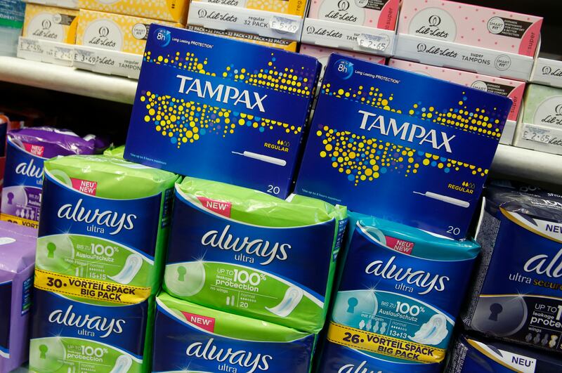 FILE - Women's sanitary products on sale at a small pharmacy in London, Friday, March, 18, 2016.
