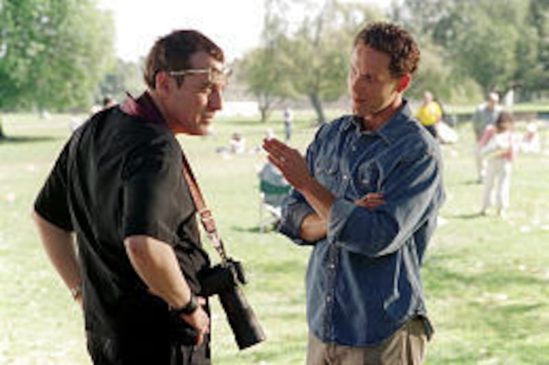 Aggressive photographer Rex Harper (Tom Sizemore) is confronted by movie star Bo Laramie (Cole Hauser) in the lame thriller "Paparazzi."