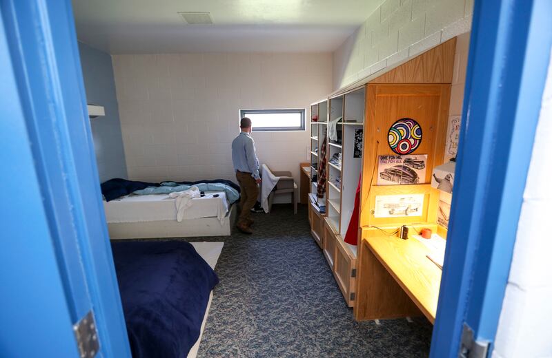 Blake Harris, unit nursing director at the Utah State Hospital, inspects a double room in a wing of the Inpatient Forensic Restoration Unit at the Provo hospital on Thursday, July 19, 2018.