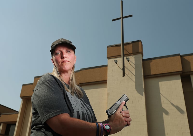 Connie Peterson stands outside the Salt Lake Christian Center where she attends church in Millcreek on Wednesday, Aug. 1, 2018. Peterson has a concealed gun during worship.