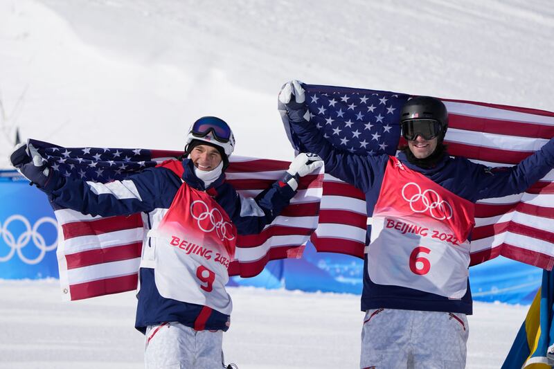 Silver medal winner United State’s Nick Goepper (9) and Gold medal winner United States’ Alexander Hall (6) celebrate with the American flag