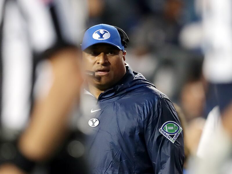BYU coach Kalani Sitake, walks off the field after a timeout as BYU and USF play in Provo on Saturday, Sept. 25, 2021.
