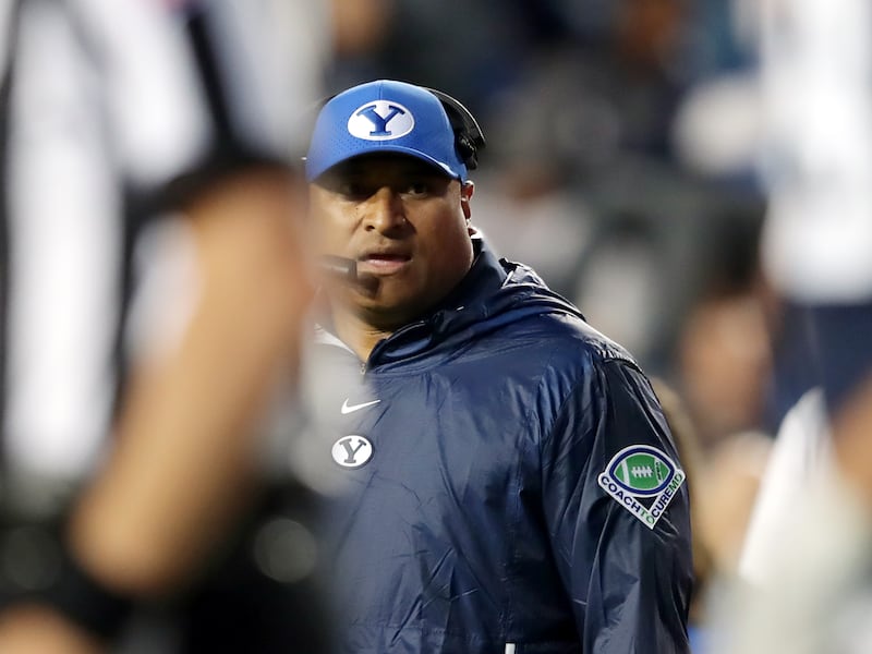 BYU coach Kalani Sitake, walks off the field after a timeout as BYU and USF play in Provo on Saturday, Sept. 25, 2021.