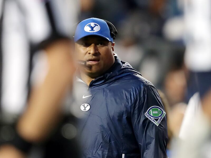 BYU coach Kalani Sitake, walks off the field after a timeout as BYU and USF play in Provo on Saturday, Sept. 25, 2021.