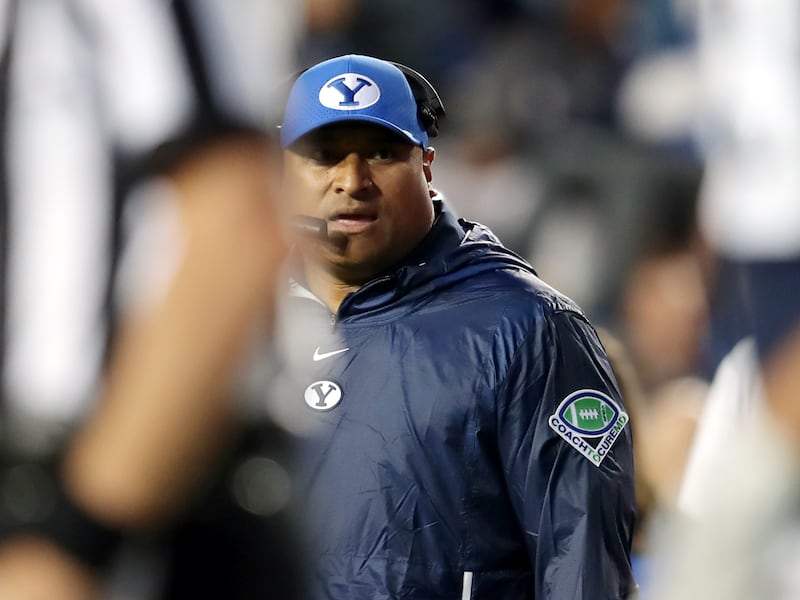 BYU coach Kalani Sitake, walks off the field after a timeout as BYU and USF play in Provo on Saturday, Sept. 25, 2021.