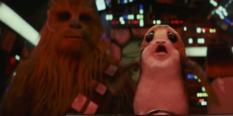 Among the new characters introduced in “Star Wars: The Last Jedi” are the birds known as “porgs,” one of which is shown here hitching a ride with Chewbacca on the Millennium Falcon.