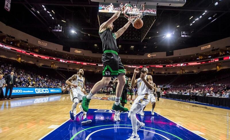 Utah Valley senior forward/center Isaac Neilson puts down a dunk at the 2017 WAC Basketball Tournament at Orleans Arena in Las Vegas.