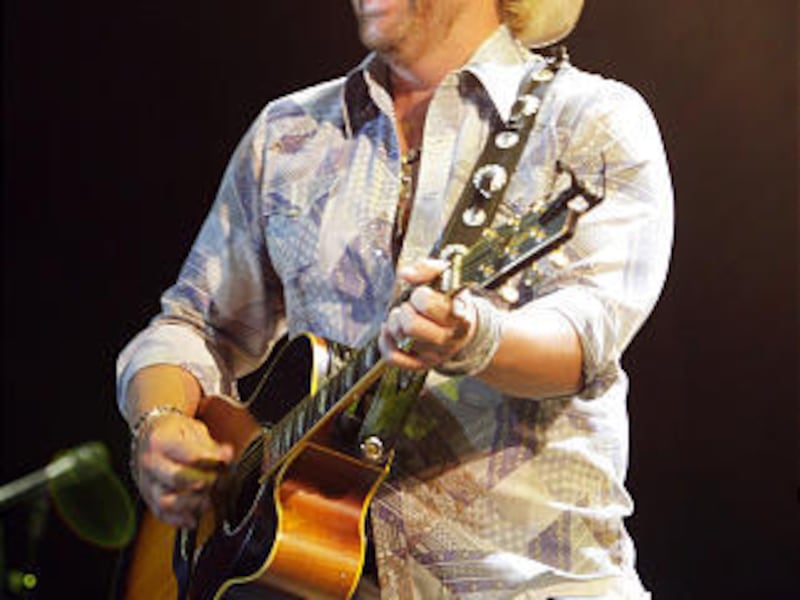 Country star Toby Keith performs Saturday in Utah.