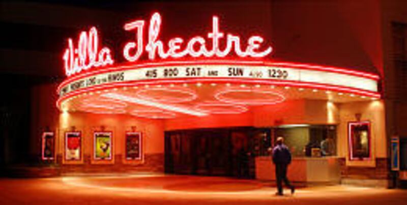 The colorful marquee above the entrance to the Villa Theatre lights up the night at the famous landmark's final screening on Feb. 18, 2003.