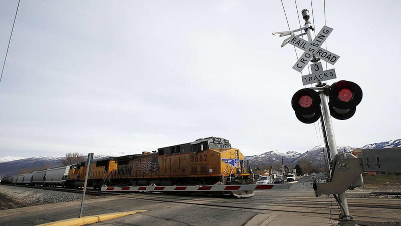 FILE— A Union Pacific train passes through Woods Cross at about 900 West and 1500 South, Tuesday, Feb. 18, 2014.