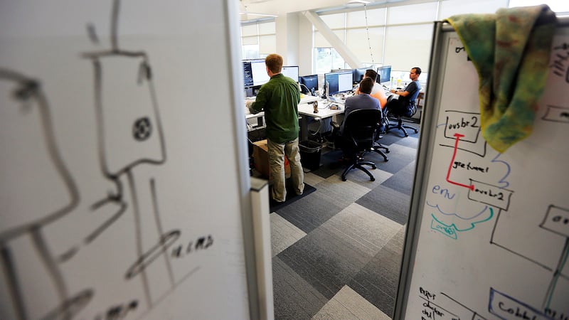 FILE - Employees work at Vivint Smart Home in Lehi on Thursday, Sept. 14, 2017.