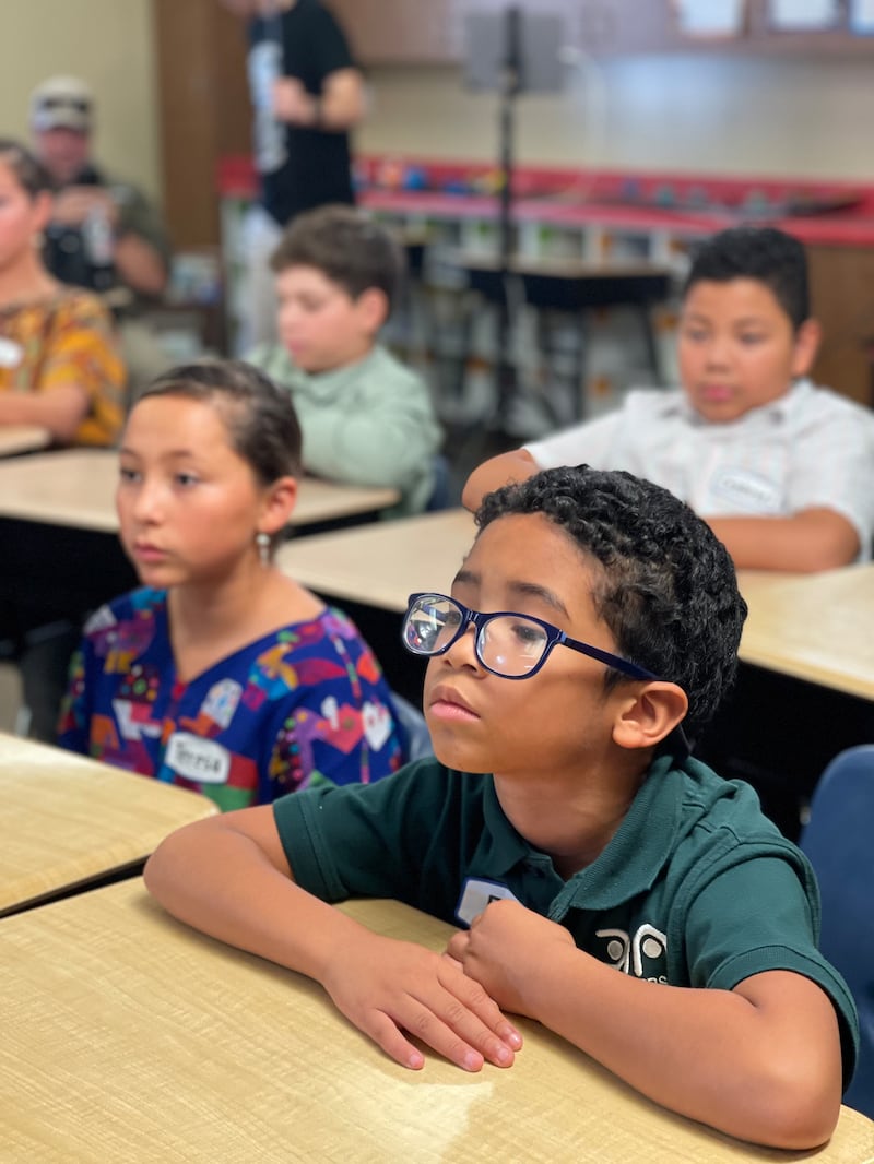 Children in a classroom in Mexico participate in a lesson about human rights in 2024.