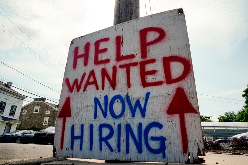 A “help wanted” sign is posted outside of a business in Philadelphia on Wednesday, June 22, 2022.