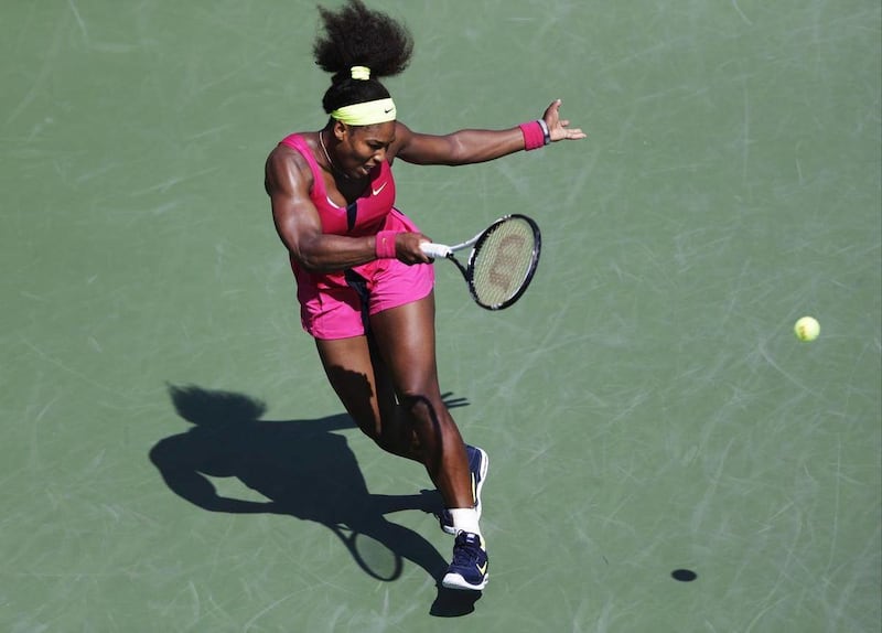 Serena Williams returns a shot to Russia's Ekaterina Makarova in the third round of play at the 2012 US Open tennis tournament, Saturday, Sept. 1, 2012, in New York.