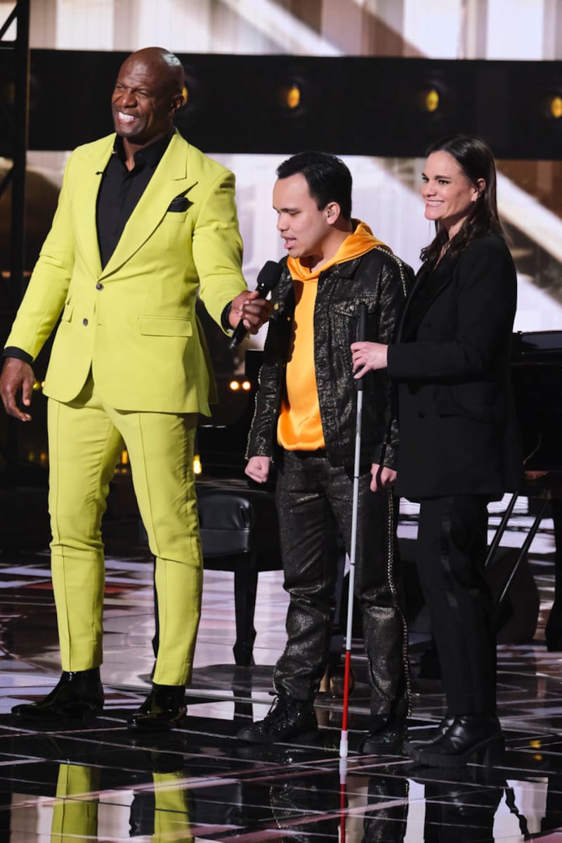 “AGT: All-Stars” host Terry Crews, left, Kodi Lee and Tina Lee are pictured during the finale of “AGT: All-Stars.”