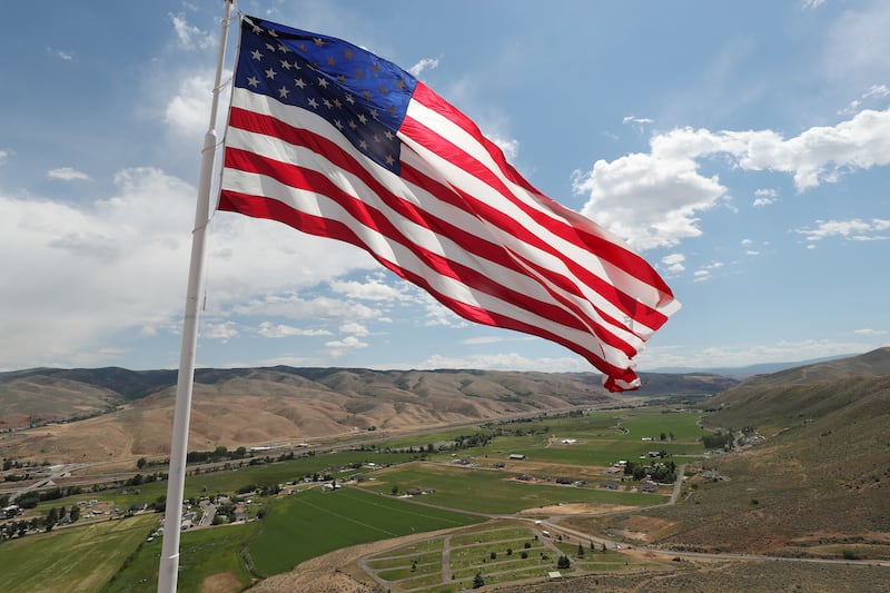 An American flag flies over Henefer, Summit County, on July 3, 2018. In honor of Veterans Day, restaurants throughout Utah are offering veterans a variety of deals. With Veterans Day falling on a Sunday this year, several restaurants are honoring deals on