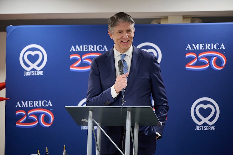 Elder Matthew S. Holland, executive director of the Church of Jesus Christ's communication department, speaks at the food donation event held in Dallas, Texas, on Thursday, May 14, 2026.