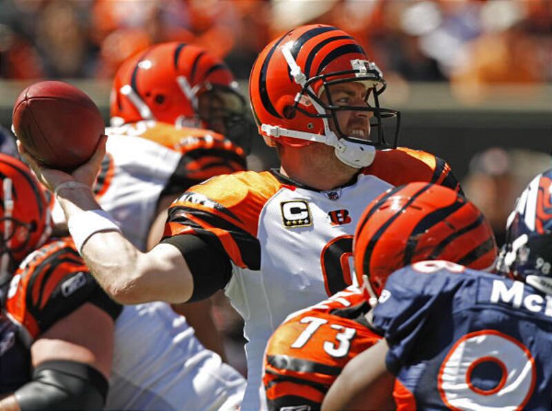 Cincinnati Bengals quarterback Carson Palmer (9) passes against the Denver Broncos Sunday in Cincinnati.