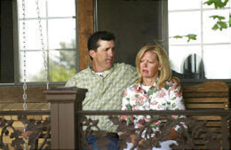 On their front porch, Kevin and Heidi Bardsley discuss the next step in the process of finding their son. They plan to continue the search.