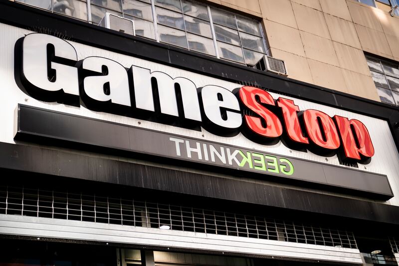 Pedestrians pass a GameStop store on 14th Street at Union Square, Thursday, Jan. 28, 2021, in the Manhattan borough of New York.