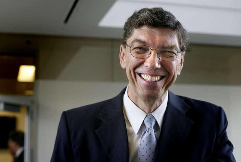 Clayton Christensen, seen here in an Oct. 29, 2010, file photo, presented at BYU's Women's Conference with his daughter Ann.
