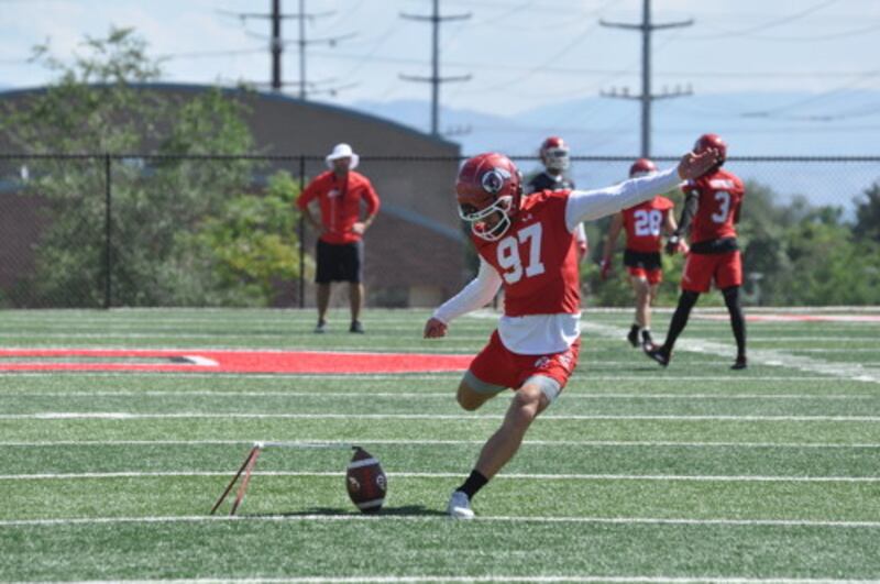 Utah’s Jadon Redding makes a kick during the Utes’ fall camp at the University of Utah.